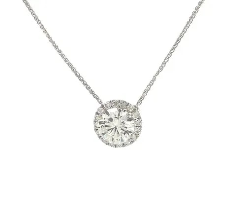 DIAMOND HALO GOLD PENDANT 2.15CT 14K WHITE CHAIN NECKLACE: DIAMOND HALO GOLD PENDANT 2.15CT 14K WHITE CHAIN NECKLACE This stunning pendant and chain necklace is crafted from 14k white gold with a polished finish. The pendant features a round frame with a bril