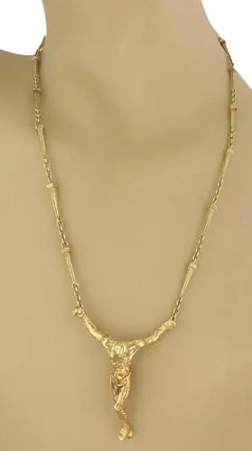 SALVADOR DALI CHRISTO DE SAN JUAN 18K GOLD JESUS PENDANT CHAIN NECKLACE: SALVADOR DALI CHRISTO DE SAN JUAN 18K GOLD JESUS PENDANT CHAIN NECKLACE An amazing authentic Salvador Dali Collection, this 18k yellow gold pendant and chain features a detailed sculpted full figure o