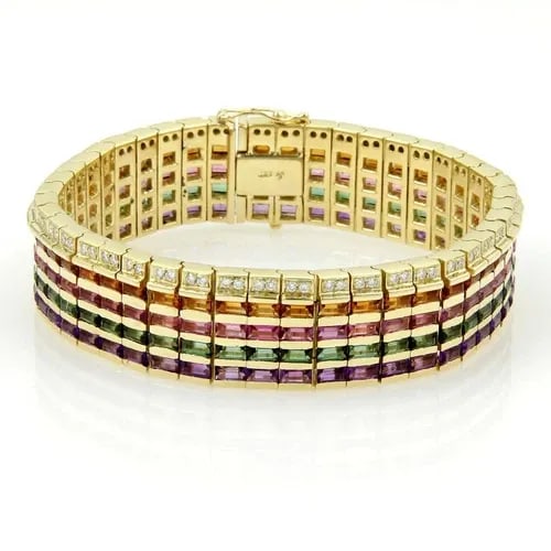 DIAMOND & GEMS GOLD BRACELET 18K YELLOW WIDE FLEX LINK BAND: DIAMOND & GEMS GOLD BRACELET 18K YELLOW WIDE FLEX LINK BAND This Diamond & Gems Gold Bracelet is a stunning piece of jewelry for women, featuring a wide flex link band made of 18k yellow gold. The mai