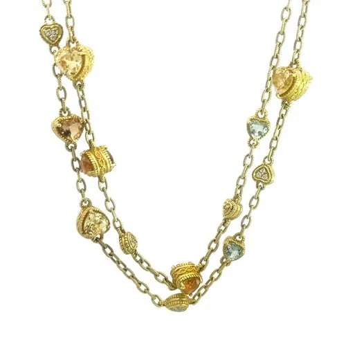 JUDITH RIPKA DIAMOND GOLD NECKLACE 18K YELLOW HEARTS MOTIF GEMSTONES 34" LONG: JUDITH RIPKA DIAMOND GOLD NECKLACE 18K YELLOW HEARTS MOTIF GEMSTONES 34" LONG This gorgeous Judith Ripka necklace features a long textured oval link chain with assorted shape and size hearts motif att