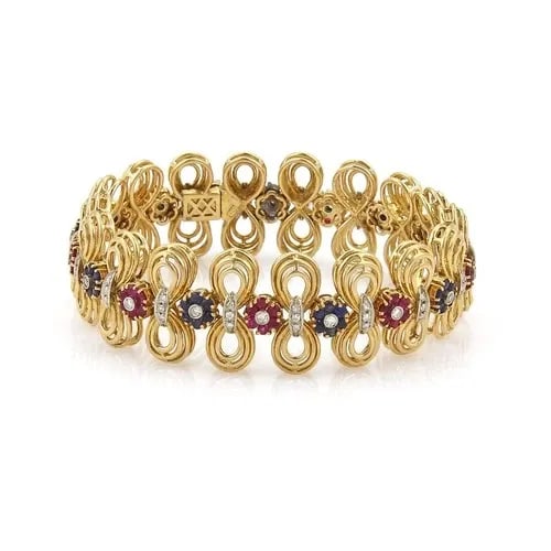 DIAMOND GEMSTONE BRACELET 18K YELLOW GOLD FLORAL DOUBLE LOOP LINK STYLE: DIAMOND GEMSTONE BRACELET 18K YELLOW GOLD FLORAL DOUBLE LOOP LINK STYLE This Diamond Gemstone Bracelet is a stunning piece of 18k Gold jewelry with a floral double loop design. Featuring a round-cut