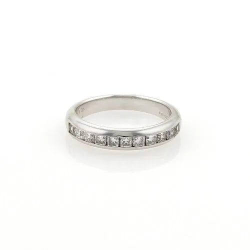 TIFFANY & CO. LUCIDA DIAMONDS PLATINUM RING PRINCESS CUT HALF CIRCLE: TIFFANY & CO. LUCIDA DIAMONDS PLATINUM RING PRINCESS CUT HALF CIRCLE The Tiffany & Co. Lucida Diamonds Platinum Ring features a stunning princess cut diamond set in 950 platinum. This elegant ring fro