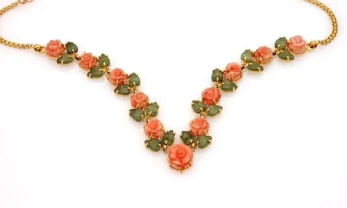 GOLD CORAL JACE NECKLACE 22K YELLOW CARVED ROSES & LEAVES: GOLD CORAL JACE NECKLACE 22K YELLOW CARVED ROSES & LEAVES This stunning coral and jade necklace featuring intricate detail of roses and leaves made from natural orange and green coral stones set in 22