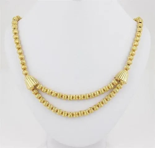 YELLOW GOLD 18K BEAD NECKLACE FLUTED DOUBLE STRAND DRAPE CHAIN: YELLOW GOLD 18K BEAD NECKLACE FLUTED DOUBLE STRAND DRAPE CHAIN This is a lovely vintage necklace, it is crafted from 18k yellow gold with a high polished finish and features fluted 6mm gold beads, the
