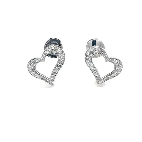 PIAGET DIAMOND GOLD STUD EARRINGS HEART 18K WHITE PAVE SET: PIAGET DIAMOND GOLD STUD EARRINGS HEART 18K WHITE PAVE SET This lovely pair of authentic earrings are by Piaget, they are crafted from 18k white gold featuring a curved shape open heart stud with pave