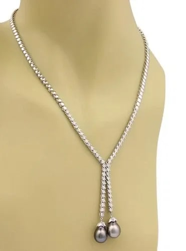 DIAMOND GOLD NECKLACE 14K WHITE 1.50CT DOUBLE LARIAT PENDANT ESTATE BEAD STYLE: DIAMOND GOLD NECKLACE 14K WHITE 1.50CT DOUBLE LARIAT PENDANT ESTATE BEAD STYLE This is a stunning Estate necklace, well-crafted from 14k white gold with a polished finish. It features a double dangle 