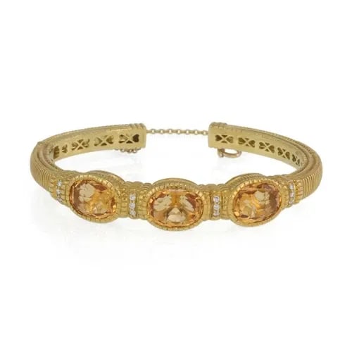 JUDITH RIPKA CUFF ORANGE GEMSTONES & DIAMONDS 18K YELLOW GOLD BRACELET: JUDITH RIPKA CUFF ORANGE GEMSTONES & DIAMONDS 18K YELLOW GOLD BRACELET The Judith Ripka Cuff Orange Gemstones & Diamonds 18k Yellow Gold Bracelet is a stunning piece of fine jewelry made in the United