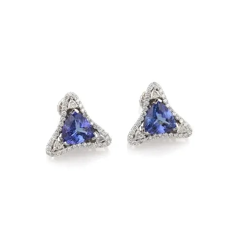 EARRINGS DIAMOND & GEMSTONE 14K WHITE GOLD FANCY TRIANGLE STUDS ESTATE: EARRINGS DIAMOND & GEMSTONE 14K WHITE GOLD FANCY TRIANGLE STUDS ESTATE These 14k white gold fancy triangle stud earrings feature a trillion-shaped purple gemstone as the main stone, surrounded by diam