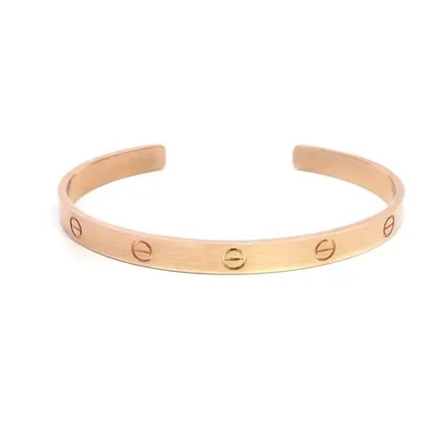 CARTIER LOVE BRACELET 18K ROSE GOLD SCREW MOTIFS SIZE 21 POCH PAPER: CARTIER LOVE BRACELET 18K ROSE GOLD SCREW MOTIFS SIZE 21 POCH PAPER This popular bracelet is by Cartier from the Love Collection; it is a luxurious piece of fine jewelry crafted from 18k rose gold fea