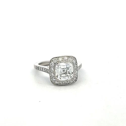 TIFFANY & CO PLATINUM HALO RING WITH 2.65 CARAT CUSHION & ROUND DIAMONDS SIZE 4: TIFFANY & CO PLATINUM HALO RING WITH 2.65 CARAT CUSHION & ROUND DIAMONDS SIZE 4 TIFFANY & CO PLATINUM HALO RING WITH 2.65 CARAT CUSHION & ROUND DIAMONDS SIZE 4 PRODUCT DESCRIPTION Designer: Tiffany & 