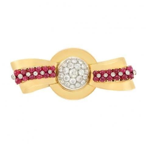MAUBOUSSIN 12.00CT OVAL RUBY & 7.30CT DIAMOND PIN BROOCH IN 18K YELLOW GOLD: MAUBOUSSIN 12.00CT OVAL RUBY & 7.30CT DIAMOND PIN BROOCH IN 18K YELLOW GOLD PRODUCT DESCRIPTION Designer: Mauboussin Title: Mauboussin 12.00 Carat Oval Shape Ruby 7.30 Carat Old Miner Cut G SI1 and Ol