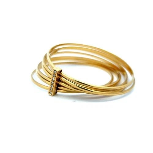 GUCCI 0.35 CARAT ROUND BRILLIANT DIAMOND 18 KARAT YELLOW GOLD BANGLE BRACELET: GUCCI 0.35 CARAT ROUND BRILLIANT DIAMOND 18 KARAT YELLOW GOLD BANGLE BRACELET PRODUCT DESCRIPTION Designer: GUCCI Title: Gucci 0.35 Carat Round Brilliant F VS Diamond 18 Karat Yellow Gold Bangle Brace