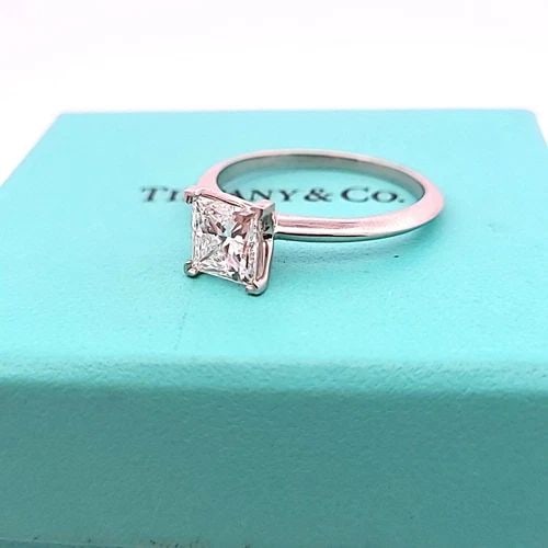 TIFFANY & CO 1.50 CARAT PRINCESS CUT F VS1 DIAMOND PLATINUM ENGAGEMENT RING: TIFFANY & CO 1.50 CARAT PRINCESS CUT F VS1 DIAMOND PLATINUM ENGAGEMENT RING Designer: Tiffany & Co Title: Tiffany & Co 1.50 Carat Princess Cut F VS1 Diamond Platinum Engagement Ring Style: Engagement 