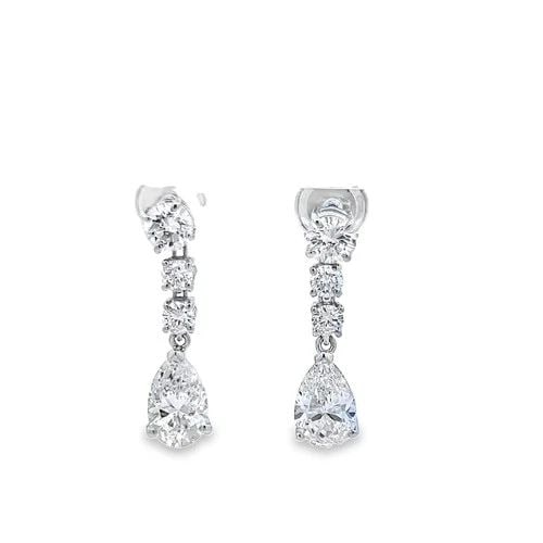 PLATINUM DROP EARRINGS WITH 4.25 CARAT ROUND & PEAR DIAMONDS J SI GIA: PLATINUM DROP EARRINGS WITH 4.25 CARAT ROUND & PEAR DIAMONDS J SI GIA PLATINUM DROP EARRINGS WITH 4.25 CARAT ROUND & PEAR DIAMONDS J SI GIA PRODUCT DESCRIPTION Video: Video Link Detailed Description: 