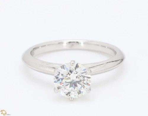 TIFFANY & CO.. 1.35 CARAT H-VS1 DIAMOND PLATINUM ENGAGEMENT RING (1 of 2)