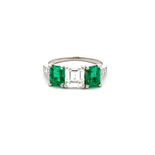 TIFFANY & CO. 1.50 CARAT EMERALD 1.34 DIAMOND PLATINUM THREE-STONE RING: TIFFANY & CO. 1.50 CARAT EMERALD 1.34 DIAMOND PLATINUM THREE-STONE RING Title: Tiffany & Co 1.50 Carat Emerald Cut Emerald 1.34 Carat Emerald Cut G VS1 and Round Brilliant F VS1 Diamond Platinum Three