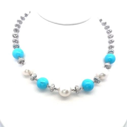 VINTAGE 18K WHITE GOLD LINK NECKLACE WITH TURQUOISE, PEARL & 1.5 CARAT DIAMOND: VINTAGE 18K WHITE GOLD LINK NECKLACE WITH TURQUOISE, PEARL & 1.5 CARAT DIAMOND Detailed Description: Elevate your style with this vintage 18K white gold necklace, showcasing a harmonious blend of pear