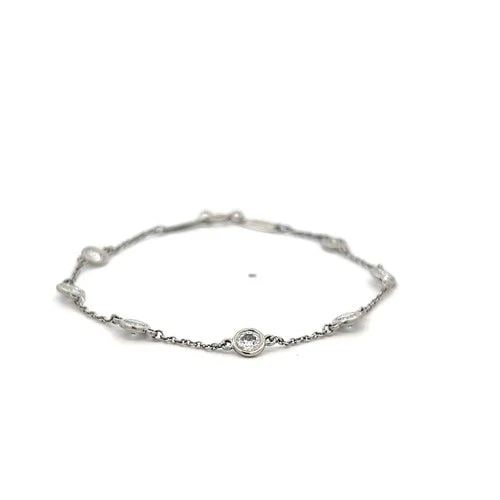 TIFFANY & CO PLATINUM LINK BRACELET WITH 1.26 CARAT ROUND F-VS DIAMONDS: TIFFANY & CO PLATINUM LINK BRACELET WITH 1.26 CARAT ROUND F-VS DIAMONDS TIFFANY & CO PLATINUM LINK BRACELET WITH 1.26 CARAT ROUND F-VS DIAMONDS PRODUCT DESCRIPTION Designer: Tiffany & Co Detailed Desc