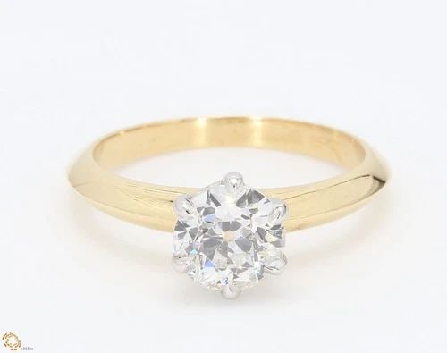 TIFFANY & CO.. 1.07 CARAT F-SI1 DIAMOND 18K YG ENGAGEMENT RING: TIFFANY & CO.. 1.07 CARAT F-SI1 DIAMOND 18K YG ENGAGEMENT RING Title: Tiffany and Co 1.07 Carat Circular Brilliant Shape F-SI1 Diamond 18 Karat Yellow Gold Engagement Ring Style: Engagement Metal: 18 