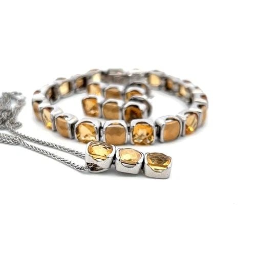 30.00 CARAT CITRINE 18 KARAT WHITE GOLD TENNIS BRACELET EARRINGS AND NECKLACE: 30.00 CARAT CITRINE 18 KARAT WHITE GOLD TENNIS BRACELET EARRINGS AND NECKLACE Title: 30.00 Carat Cushion Modified Brilliant Cut Citrine 18 Karat White Gold Tennis Bracelet Style: Tennis Metal: 18 Kara