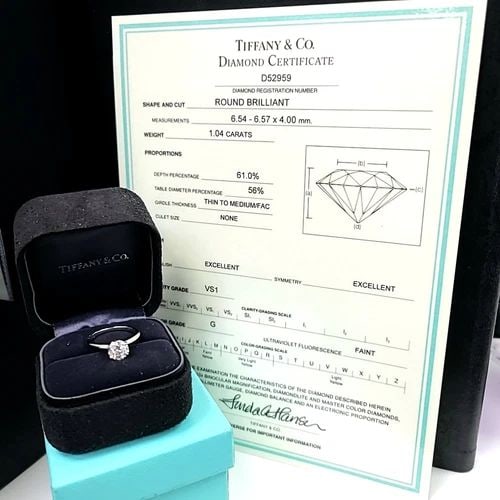 TIFFANY & CO. 1.04 CARAT ROUND BRILLIANT G VS1 DIAMOND PLATINUM ENGAGEMENT RING: TIFFANY & CO. 1.04 CARAT ROUND BRILLIANT G VS1 DIAMOND PLATINUM ENGAGEMENT RING Title: Tiffany & Co 1.04 Carat Round Brilliant G VS1 Diamond Platinum Engagement Ring Style: Engagement Metal: Platinum 