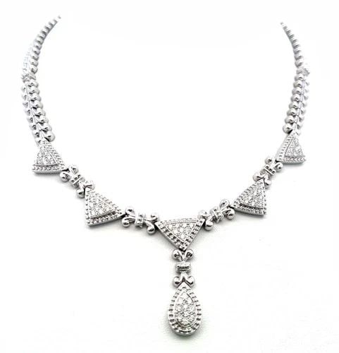 VINTAGE 14K WHITE GOLD PENDANT NECKLACE WITH 1.5 CARAT ROUND I-SI DIAMONDS: VINTAGE 14K WHITE GOLD PENDANT NECKLACE WITH 1.5 CARAT ROUND I-SI DIAMONDS Detailed Description: Shine bright with this vintage 14K white gold pendant, featuring a dazzling 1.5-carat diamond in a roun