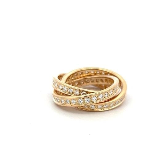 CARTIER VINTAGE 18K YELLOW GOLD TRINITY RING WITH 1.40 CARAT DIAMONDS SIZE 5.75: CARTIER VINTAGE 18K YELLOW GOLD TRINITY RING WITH 1.40 CARAT DIAMONDS SIZE 5.75 Designer: CARTIER Detailed Description: The essence of elegance wrapped in a unique design, this Cartier Trinity ring is