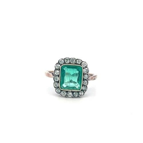 10K TWO TONE EDWARDIAN RING WITH 0.9 CT. OLD EUROPEAN DIAMOND & 1.5 CT. EMERALD: 10K TWO TONE EDWARDIAN RING WITH 0.9 CT. OLD EUROPEAN DIAMOND & 1.5 CT. EMERALD Detailed Description: 10K Gold, Size 5.25 Delight in timeless elegance with this antique Edwardian ring, showcasing a ca