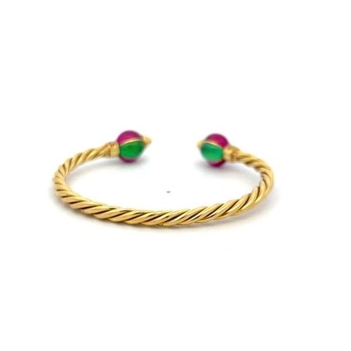 18K YG CUFF BRACELET WITH 0.12 CARAT DIAMONDS 9X6.6 MM GREEN SAPPHIRES & RUBIES: 18K YG CUFF BRACELET WITH 0.12 CARAT DIAMONDS 9X6.6 MM GREEN SAPPHIRES & RUBIES Detailed Description: Vintage Estate This vintage estate cuff showcases the opulence of 18K yellow gold, combining luxur