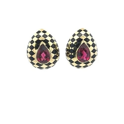 TIFFANY & CO. ANGELA CUMMINGS 12.5CT TOURMALINE BLACK JADE 18K GOLD CLIP EARRING: TIFFANY & CO. ANGELA CUMMINGS 12.5CT TOURMALINE BLACK JADE 18K GOLD CLIP EARRING Designer: Tiffany & Co Title: These striking Tiffany & Co. Angela Cummings clip-on earrings embody the designer’s ico