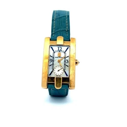 HARRY WINSTON AVENUE 36-22MM DIAL 18 KARAT YELLOW GOLD WRIST WATCH: HARRY WINSTON AVENUE 36-22MM DIAL 18 KARAT YELLOW GOLD WRIST WATCH PRODUCT DESCRIPTION Designer: HARRY WINSTON Title: Harry Winston 18 Karat Yellow Gold Wrist Watches Style: Wrist Metal: 18 Karat Yell