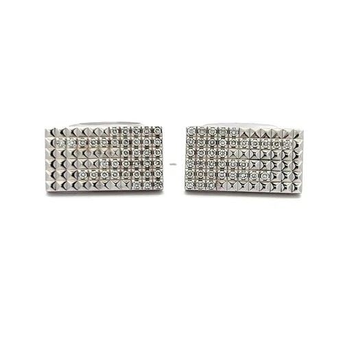 S.T DUPONT 18K WHITE GOLD WHALE BACK CUFFLINKS WITH 0.66 CARAT ROUND DIAMONDS: S.T DUPONT 18K WHITE GOLD WHALE BACK CUFFLINKS WITH 0.66 CARAT ROUND DIAMONDS Designer: S.T DUPONT Detailed Description: Elevate your style with these sophisticated 18 Karat White Gold cufflinks, show