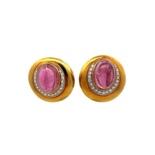 15.7–11.5MM PINK TOURMALINE CLIP-ON EARRINGS 1.60CT G VS DIAMONDS 18K GOLD: 15.7–11.5MM PINK TOURMALINE CLIP-ON EARRINGS 1.60CT G VS DIAMONDS 18K GOLD Title: These luxurious 18K yellow gold clip-on earrings feature two striking pink tourmaline cabochons measuring approximat