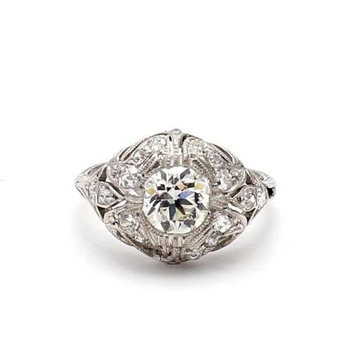 1.44 CARAT ROUND BRILLIANT J VS1 AND DIAMOND PLATINUM WEDDING RING (1 of 2)