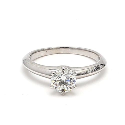 TIFFANY & CO.. 0.77 CARAT G-VS2 DIAMOND PLATINUM ENGAGEMENT RING: TIFFANY & CO.. 0.77 CARAT G-VS2 DIAMOND PLATINUM ENGAGEMENT RING Title: Tiffany and Co 0.77 Carat Round Brilliant Shape G-VS2 Diamond Platinum Engagement Ring Style: Engagement Metal: Platinum Gemston