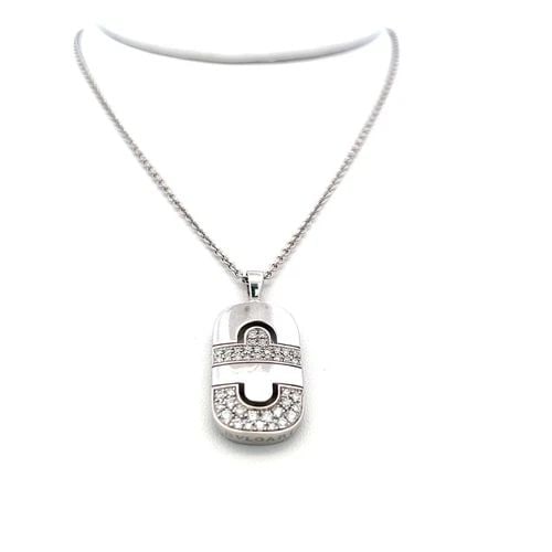 BVLGARI 0.50 CARAT ROUND BRILLIANT DIAMOND 18 KARAT WHITE GOLD PENDANT NECKLACE: PRODUCT DESCRIPTION Designer: BVLGARI Title: Bvlgari 0.50 Carat Round Brilliant F VS Diamond 18 Karat White Gold Pendant Necklace Style: Pendant Metal: 18 Karat White Gold Gemstone 1: 0.5 Carat Diamon