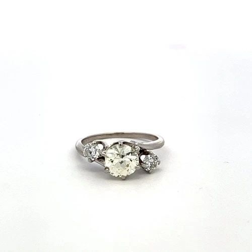 VINTAGE THREE-STONE PLATINUM RING WITH 1.30 CARAT OLD EUROPEAN CUT GIA DIAMOND: VINTAGE THREE-STONE PLATINUM RING WITH 1.30 CARAT OLD EUROPEAN CUT GIA DIAMOND Detailed Description: This vintage and estate three-stone platinum ring features a stunning 1.3 carat Old European Cut di
