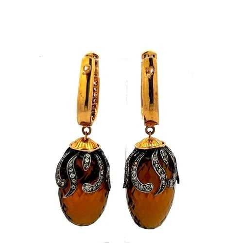 14K YG DANGLING EARRINGS WITH 1.2 CARAT DIAMONDS AND 14.5 X24.5 MM SMOKEY QUARTZ: 14K YG DANGLING EARRINGS WITH 1.2 CARAT DIAMONDS AND 14.5 X24.5 MM SMOKEY QUARTZ Detailed Description: Elevate your style with these striking vintage dangling earrings. Crafted from 14 karat yellow go