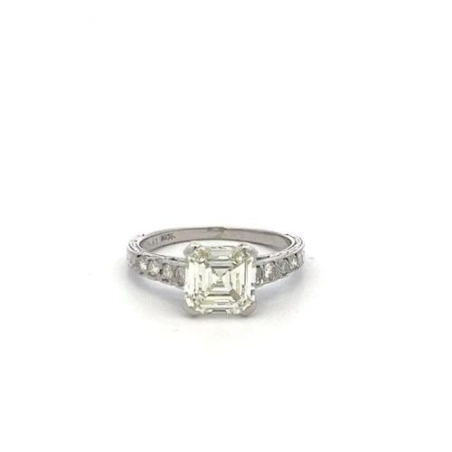 PLATINUM ENGAGEMENT RING WITH 1.07CT ASSCHER & OLD EUROPEAN CUT DIAMONDS GIA: PLATINUM ENGAGEMENT RING WITH 1.07CT ASSCHER & OLD EUROPEAN CUT DIAMONDS GIA Detailed Description: Celebrate timeless elegance with this vintage platinum engagement ring, designed to captivate the hea