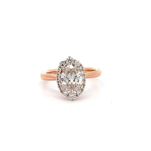 1.22 CARAT OVAL LAB-GROWN DIAMOND 0.24 CARAT ROUND DIAMOND 14K ROSE GOLD RING: 1.22 CARAT OVAL LAB-GROWN DIAMOND 0.24 CARAT ROUND DIAMOND 14K ROSE GOLD RING PRODUCT DESCRIPTION Title: 1.22 Carat Oval Shape J SI1 Lab-Grown Diamond 0.24 Carat Round Brilliant I VS Diamond 14 Karat 