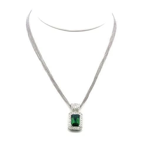 18K WG PENDANT NECKLACE WITH 0.46CT ROUND & BAGUETTE DIAMONDS & 1.5CT TOURMALINE: 18K WG PENDANT NECKLACE WITH 0.46CT ROUND & BAGUETTE DIAMONDS & 1.5CT TOURMALINE Video: Video Link Detailed Description: Capture timeless elegance with this vintage 18K white gold pendant featuring a 