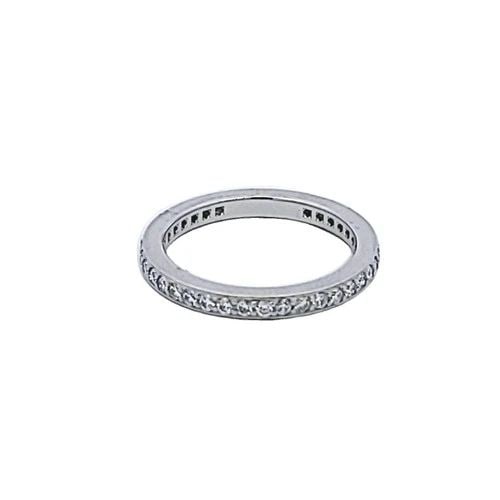 TIFFANY & CO 0.25 CARAT ROUND BRILLIANT F VS1 DIAMOND PLATINUM BAND RING: TIFFANY & CO 0.25 CARAT ROUND BRILLIANT F VS1 DIAMOND PLATINUM BAND RING Designer: Tiffany & Co Title: Tiffany & Co 0.25 Carat Round Brilliant F VS1 Diamond Platinum Band Ring Style: Band Metal: Plati