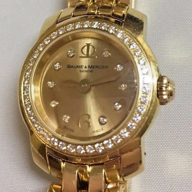 BAUME & MERCIER WATCH 18K YELLOW GOLD WITH DIAMOND BEZEL/DIAL (48 GRAMS): BAUME & MERCIER B&M WATCH 18K YELLOW GOLD WITH DIAMOND BEZEL Baume & Mercier B&M watch 18K solid Yellow Gold with Diamond Bezel You are bidding on a pre-owned Baume & Mercier B&M watch 18K solid (not 