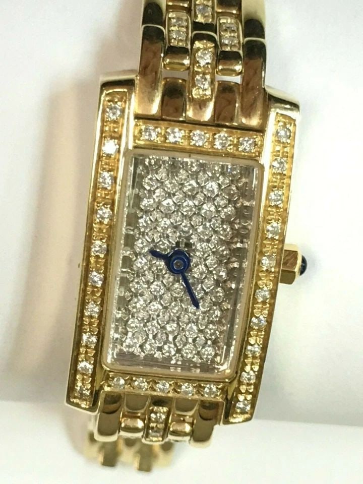 WOMAN'S 14K YELLOW GOLD MADE IN ITALY WATCH W/ 1CTS NATURAL DIAMONDS 51.3 GRAMS: WOMAN'S 14K YELLOW GOLD ITALY WATCH WITH DIAMONDS Woman's 14k Yellow Gold Italy Watch with Diamonds You are bidding on a pre-owned Woman's 14k Yellow Gold Italy Watch with Diamonds. Watch has marks an