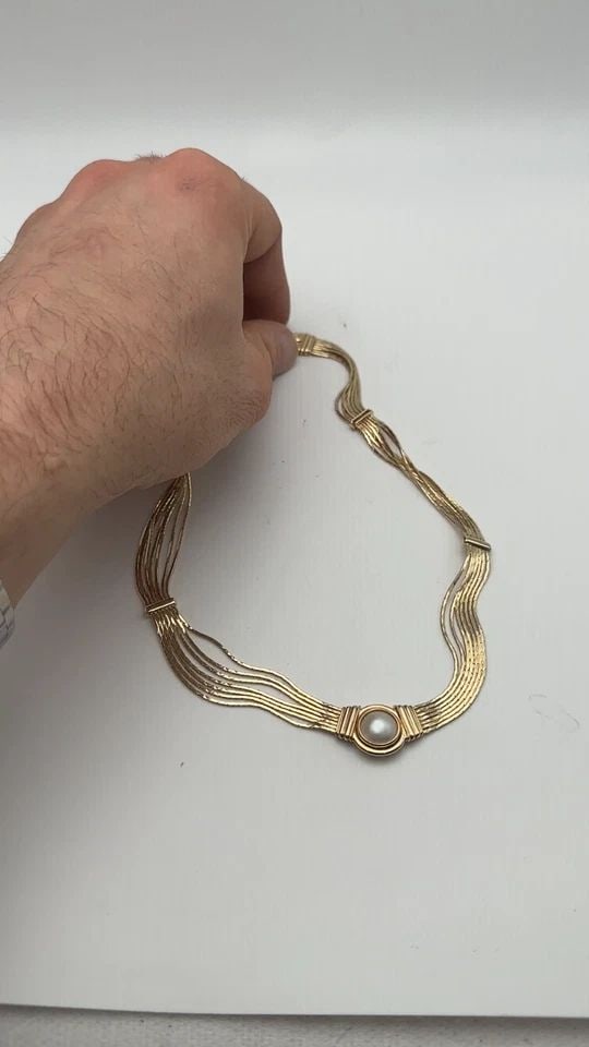 14K GOLD MULTI ROW NECKLACE WITH MABE PEARL, MADE IN ITALY, ( 16" ) 35.4G: 14k Gold Multi Strand Layered Link style Necklace with Mabe Pearl Condition: Used Material: 14k Yellow Gold, Made in Italy Necklace Size: 16 inch long, 9mm wide Total Weight: 35.4 grams Stone Info: 15