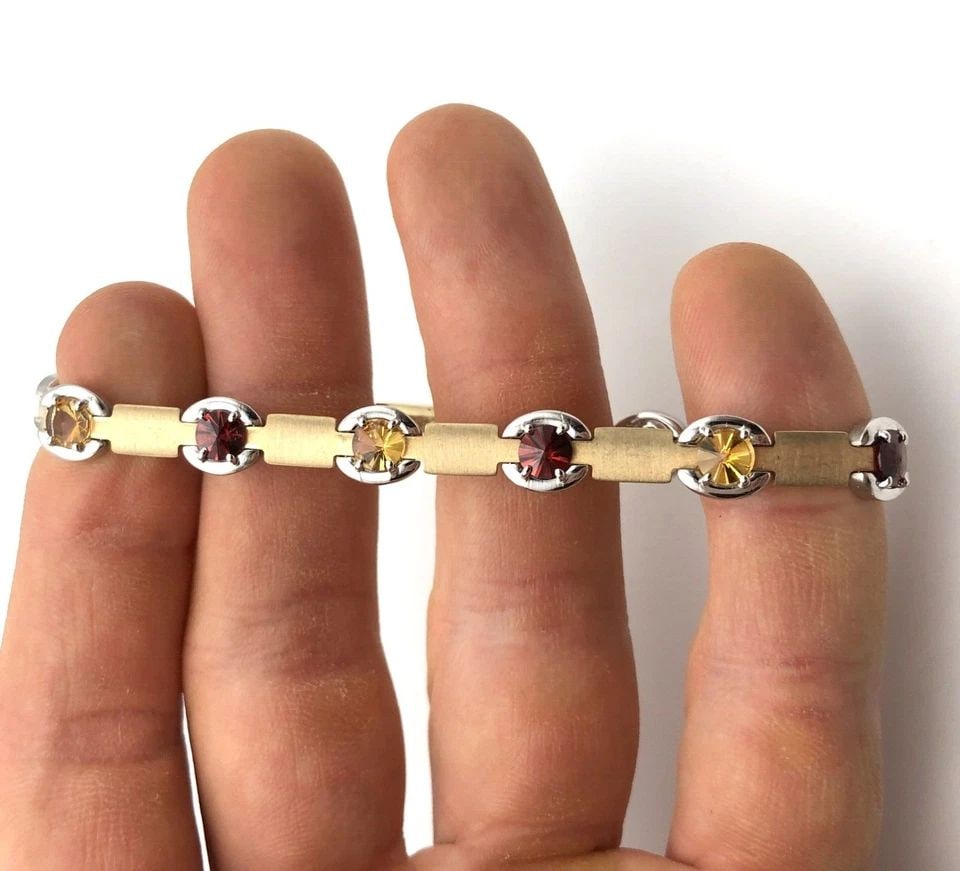14K GOLD TWO TONED TNT ITALIAN MADE BRACELET CITRINE/GARNETS ( 7.5 INCH ) 17.7G: 14K GOLD TWO TONED TNT LINKED BRACELET SET WITH CITRINE AND GARNETS 7.5" 14k Gold two toned TNT Linked Bracelet set with Citrine and Garnets Condition: Used, has been cleaned in house Material: 14k Ye