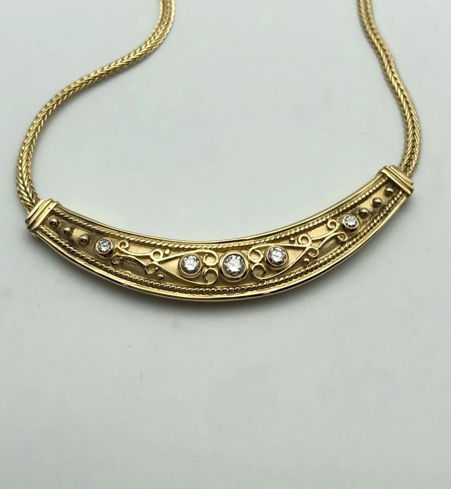14K GOLD NECKLACE, STATEMENT WITH 0.50CTW DIAMONDS (18 INCH) 17.5 GRAM: 14K GOLD NECKLACE WITH STATEMENT PENDANT SET WITH 0.50CTS OF DIAMONDS 18" 17.5G 14k Gold Necklace with Statement Pendant set with 0.50cts of Diamonds Condition: Used and cleaned, has been moved around