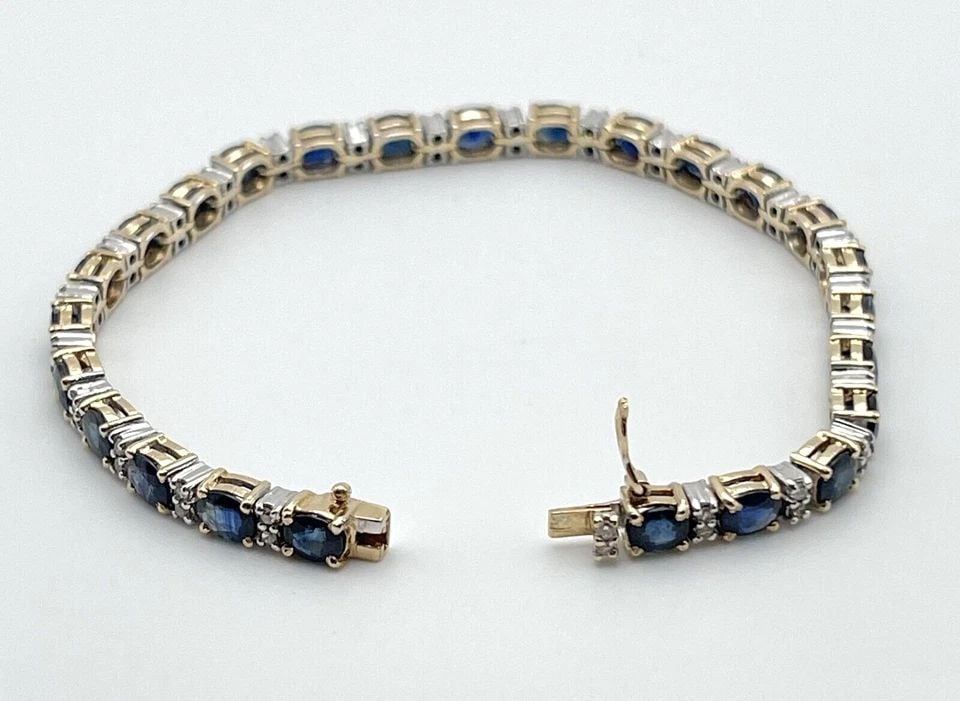 14K GOLD BRACELET, 12.5CTS SAPPHIRES, 0.50CTS DIAMONDS (7 INCH) 14.6 GRAM: 14K GOLD TWO TONED BRACELET SET WITH 12.5CTS SAPPHIRES AND 0.50CTS DIAMONDS 7" 14k Gold Two Toned Bracelet set with 12.5cts Sapphires and 0.50cts Diamonds You are bidding on a 14k Gold Two Toned Brace