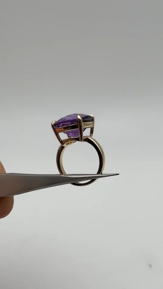 TIFFANY & CO. 18K YELLOW GOLD RING WITH AMETHYST (SIZE 5.5) 7.3 GRAM: 18K YELLOW GOLD TIFFANY & CO. RING WITH AMETHYST ( SIZE: 5.5 ) 18k Yellow Gold Tiffany & Co. Ring with Amethyst You are bidding on a 18k Yellow Gold Tiffany & Co. Ring with Amethyst. The ring has been