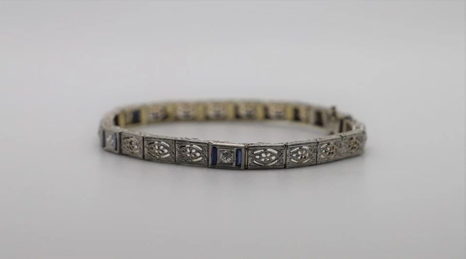 PLATINUM BRACELET WITH 14K GOLD UNDER, SAPPHIRES & DIAMONDS ( 7 INCH ) 14.8G: PLATINUM BRACELET WITH 14KT GOLD UNDERLAY AND SAPPHIRES AND DIAMONDS 7" Platinum Bracelet with 14kt gold underlay and Sapphires and Diamonds 7" You are bidding on a Platinum Bracelet with 14kt gold un